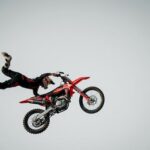Man Performing Stunt on Motorcycle