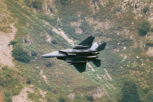 Superiority fighter flying over valley