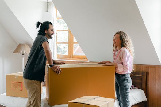 Smiling diverse couple moving in new house