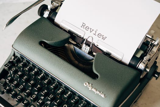 Black and White Typewriter on Table